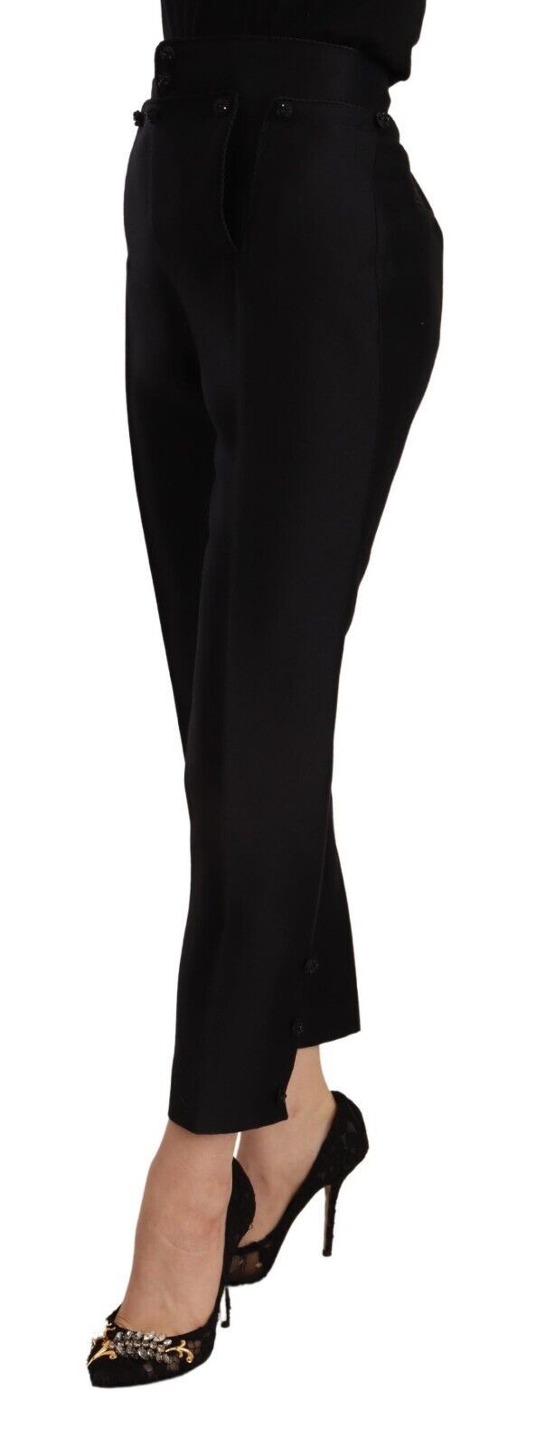 Woman wearing black pants and heels