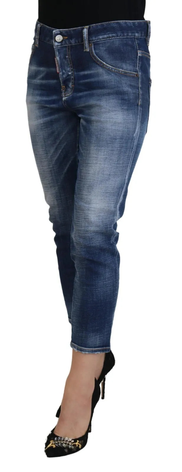 Pair of blue denim jeans with distressed design