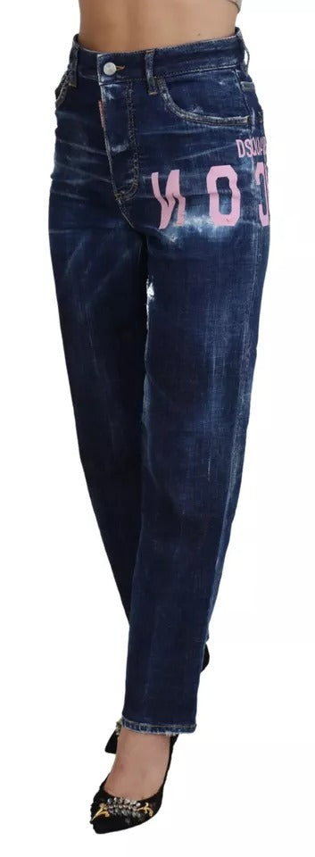 Pair of blue jeans with pink writing on back
