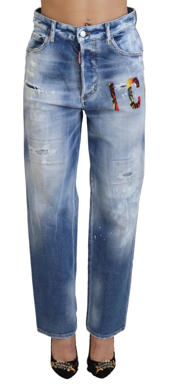 Pair of blue denim jeans with distressed design