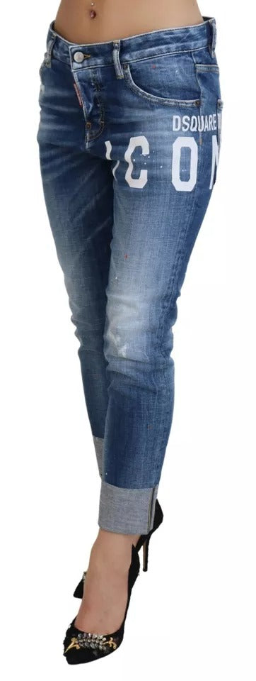 Pair of blue denim jeans with white lettering on back