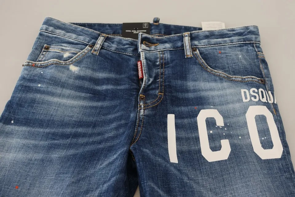 Blue denim jeans with white lettering on front