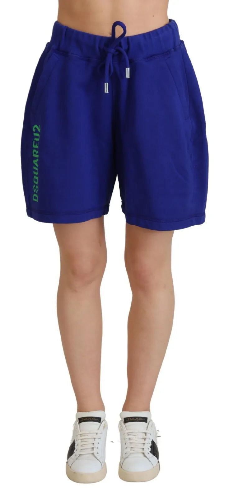 A pair of blue cotton high waist sweat shorts with a logo on the left leg. They are displayed against a neutr