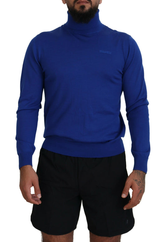 Man wearing blue turtleneck sweater and black shorts