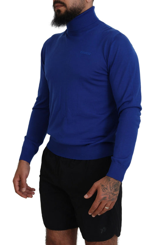 Man wearing blue turtleneck sweater and black shorts