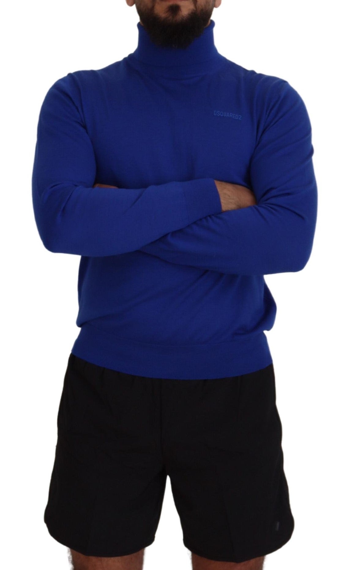 Man wearing blue long sleeve shirt and black shorts