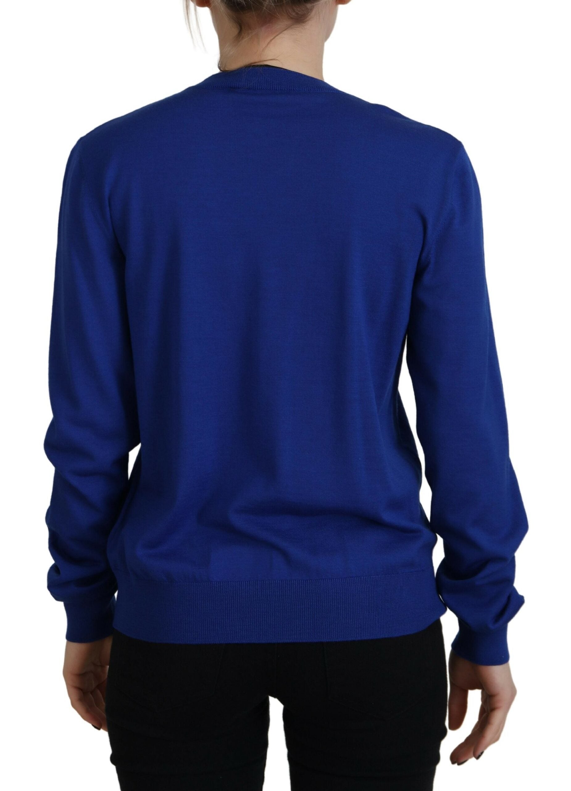 Blue long sleeve sweater on a person