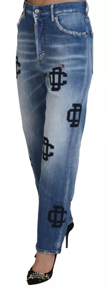 Blue denim jeans with distressed design and embroidered logo on legs