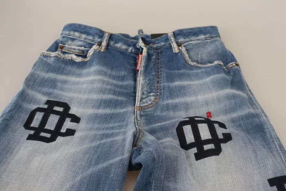 Pair of blue denim shorts with distressed design and embroidered logo