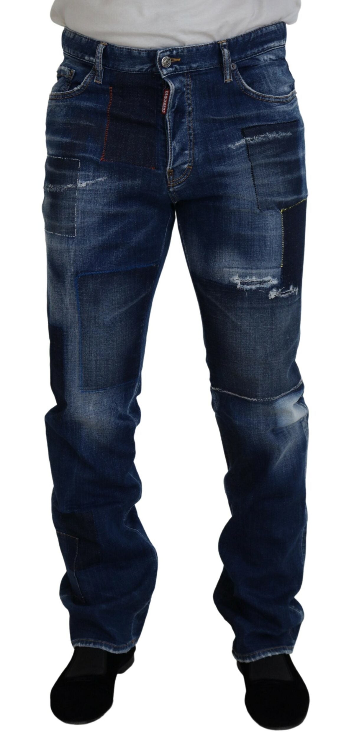 Pair of blue denim jeans with distressed areas and pockets