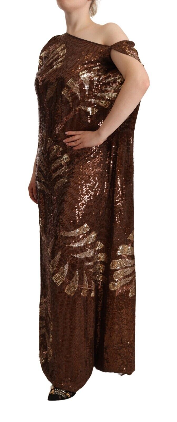 A long brown sequined dress with a leaf pattern and one shoulder design