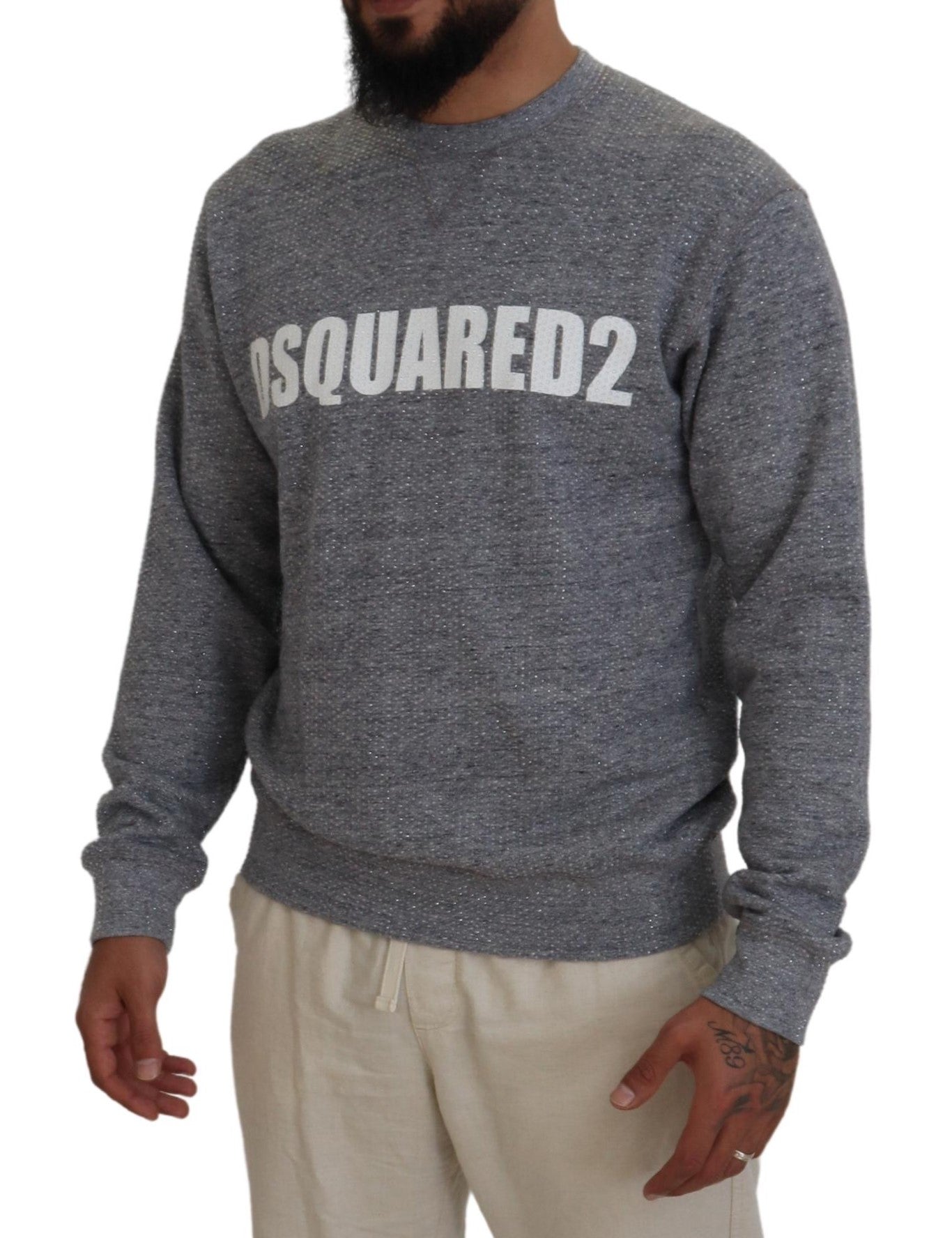 Man wearing gray sweatshirt with white lettering