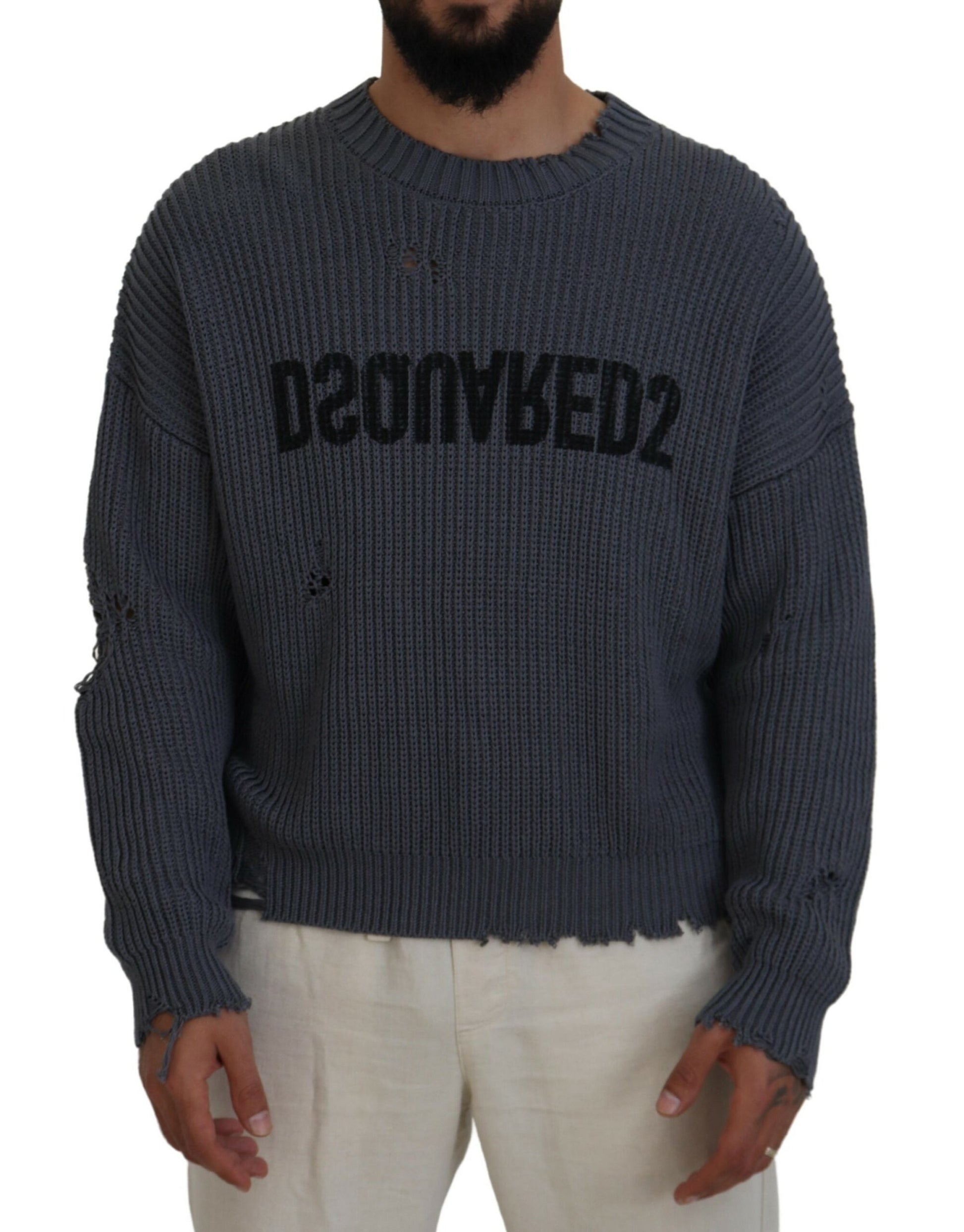Man wearing a gray sweater with black lettering