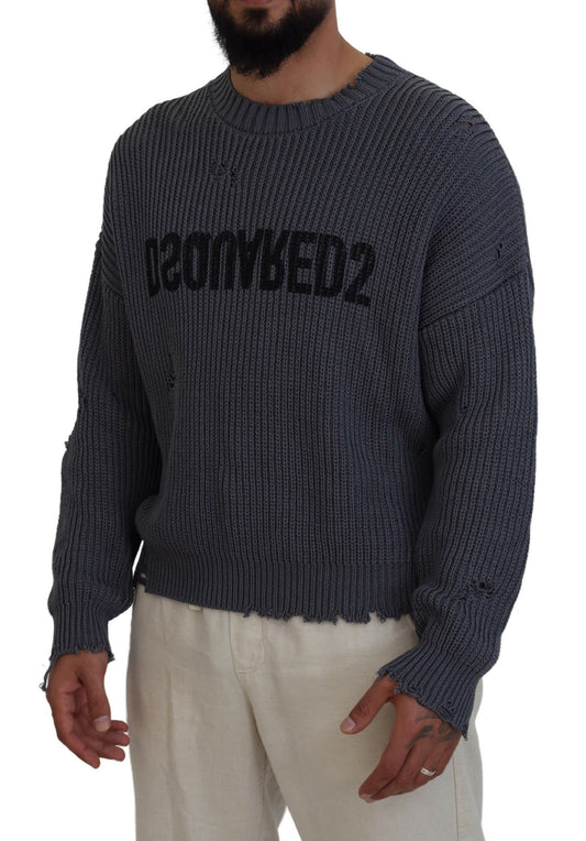 Man wearing gray sweater with black lettering