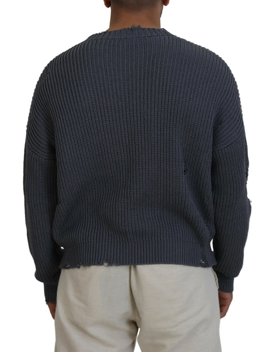 Man wearing blue knit sweater