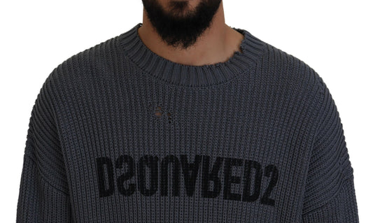 Man wearing gray sweater with black lettering