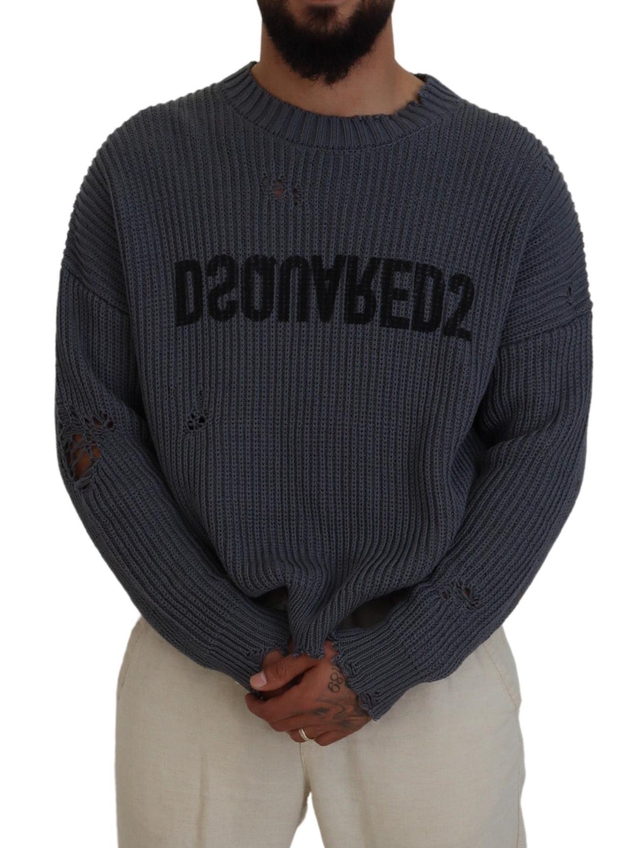 Man wearing gray sweater with black lettering