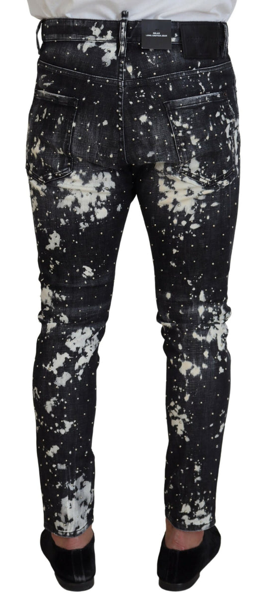 Pair of jeans with black and white spattered pattern