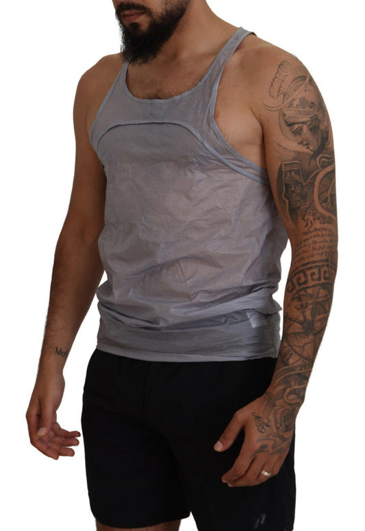 Man wearing tank top and shorts
