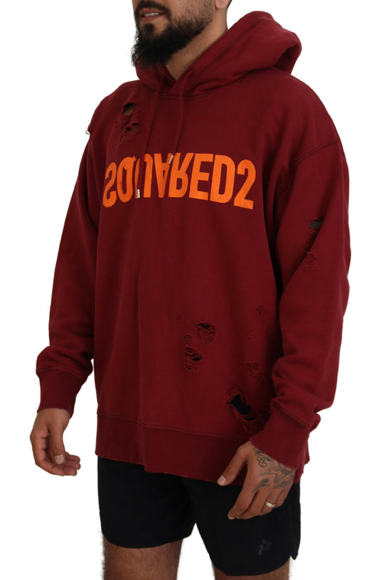 Man wearing red hoodie with orange lettering