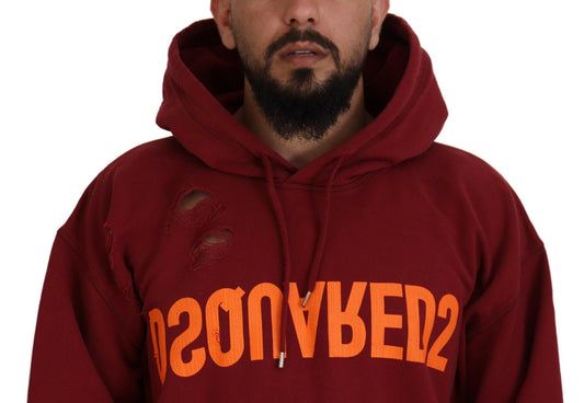 Man wearing red hoodie with orange letters