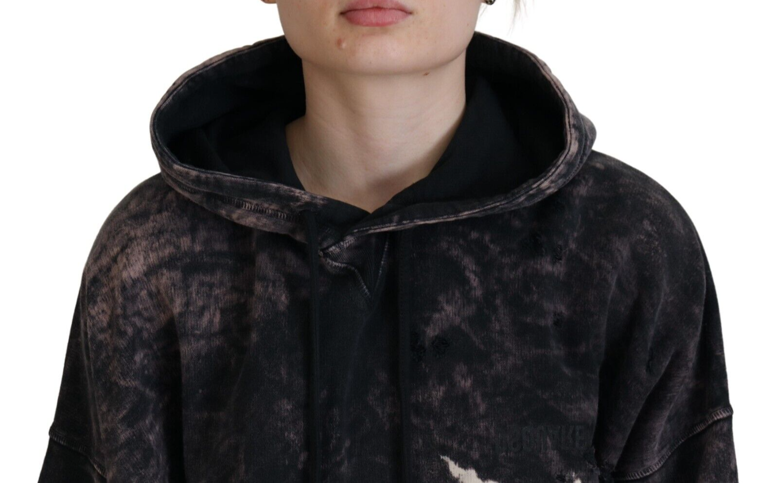 The person is wearing a hoodie