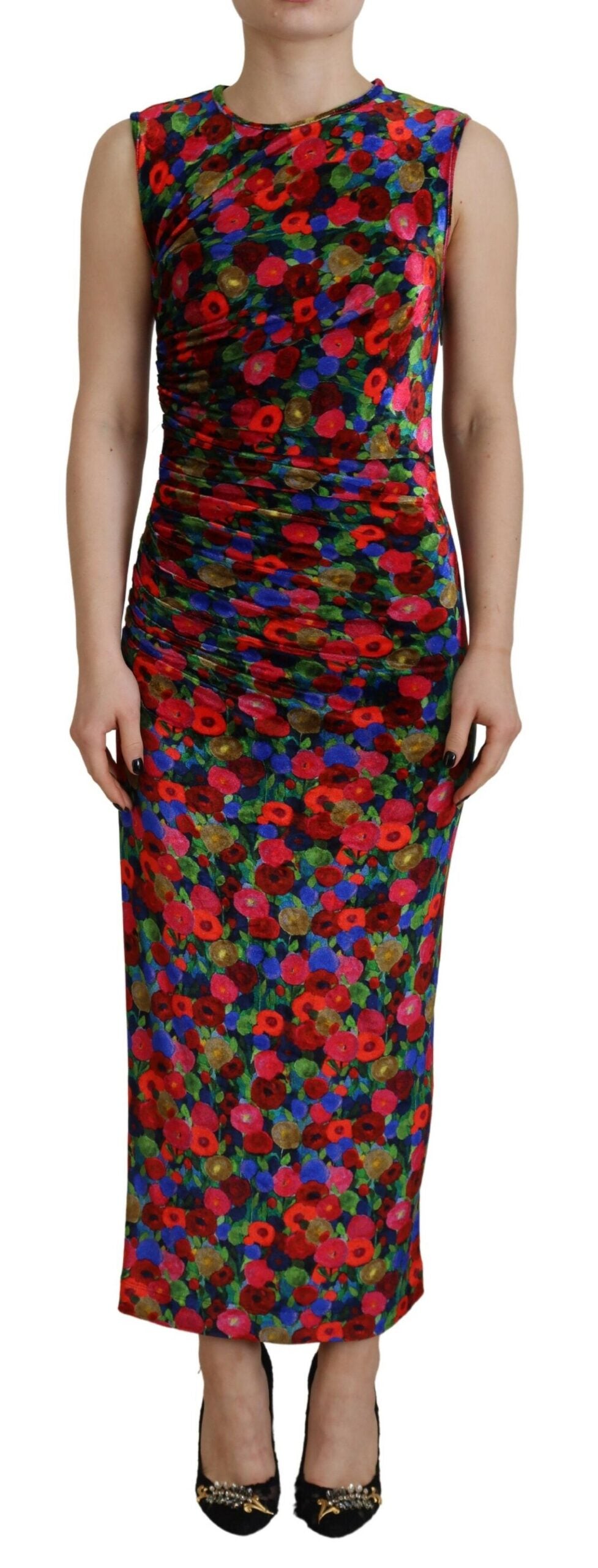 A long sleeved, ruched maxi dress with a floral pattern