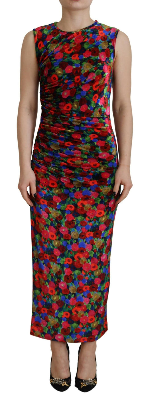 A long sleeved, ruched maxi dress with a floral pattern