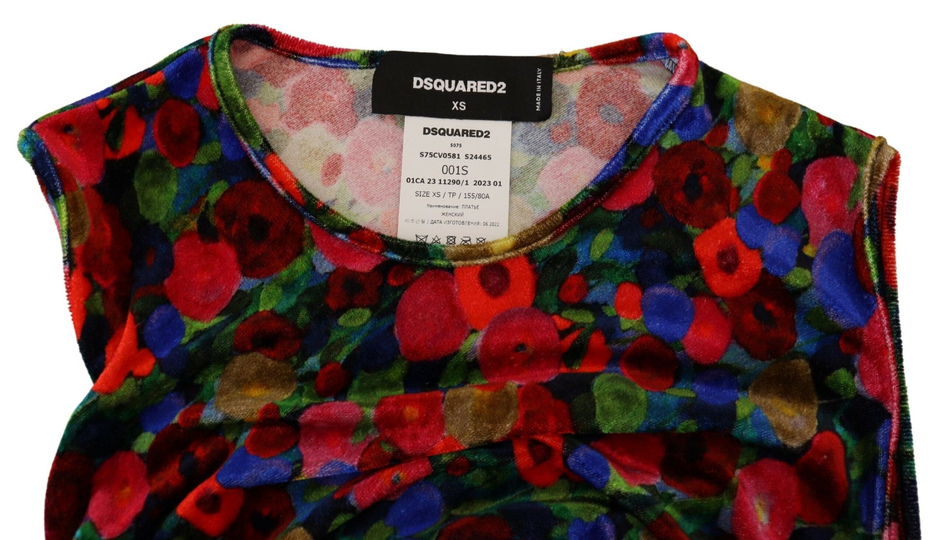 A colorful floral dress with ruched detailing and a body-hugging fit