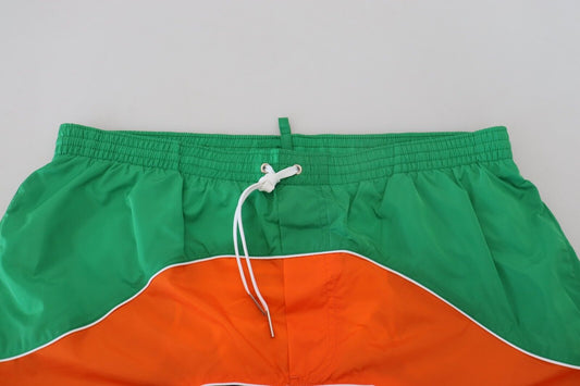 Green and orange swim trunks