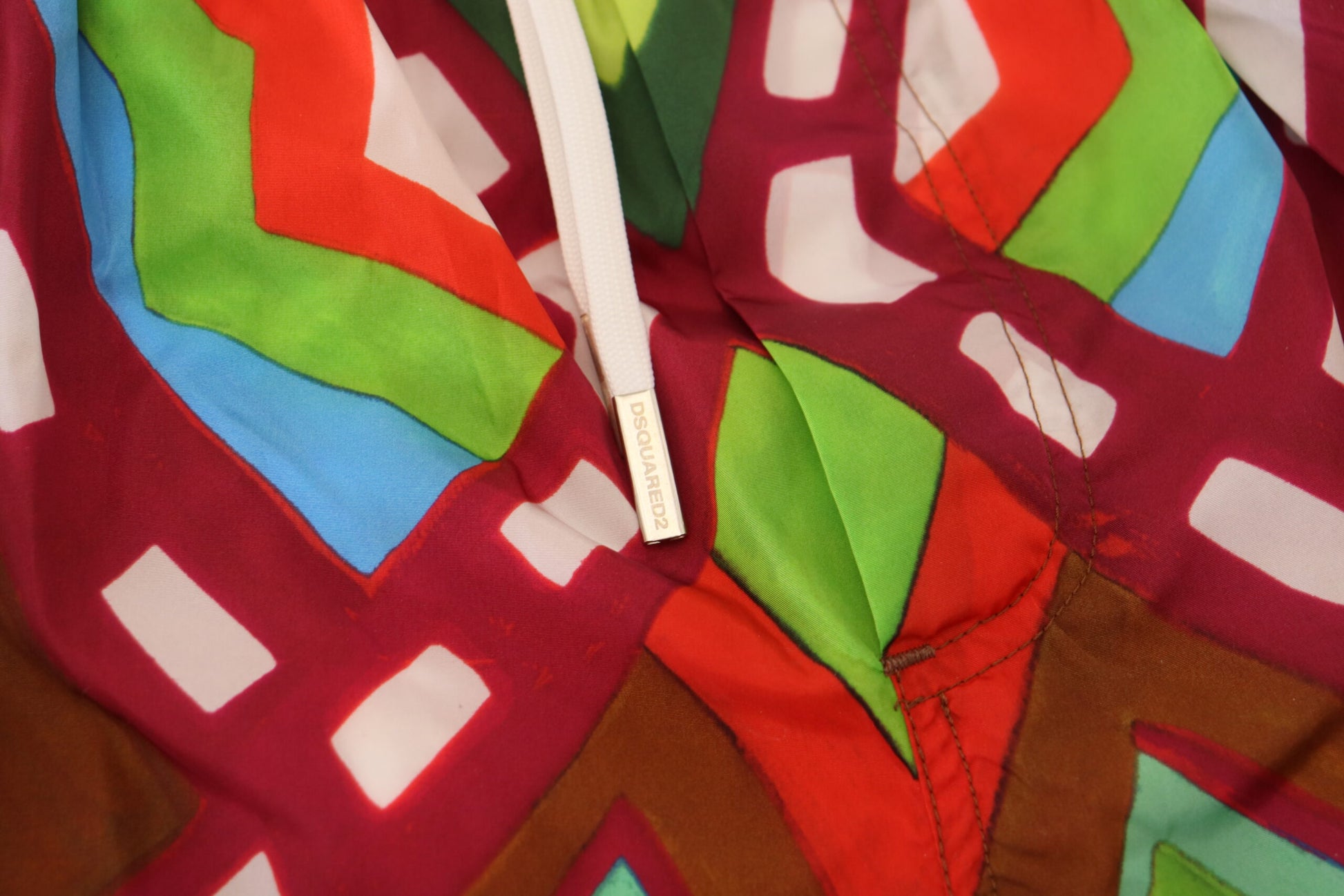 Colorful embroidered fabric with geometric patterns