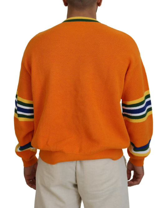 Man wearing orange sweater with yellow stripes on sleeves