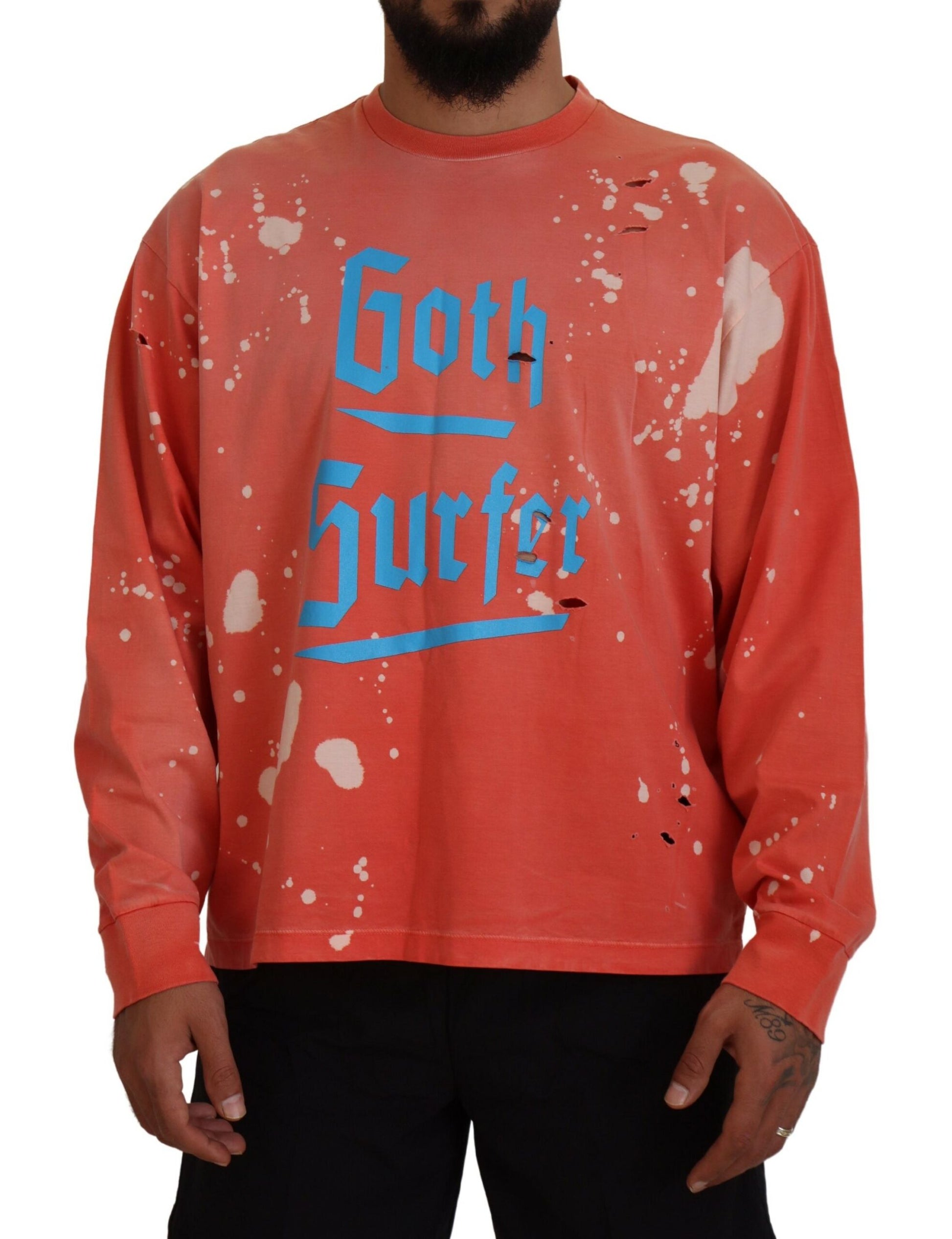 Man wearing red long sleeve shirt with peeling paint design and blue lettering