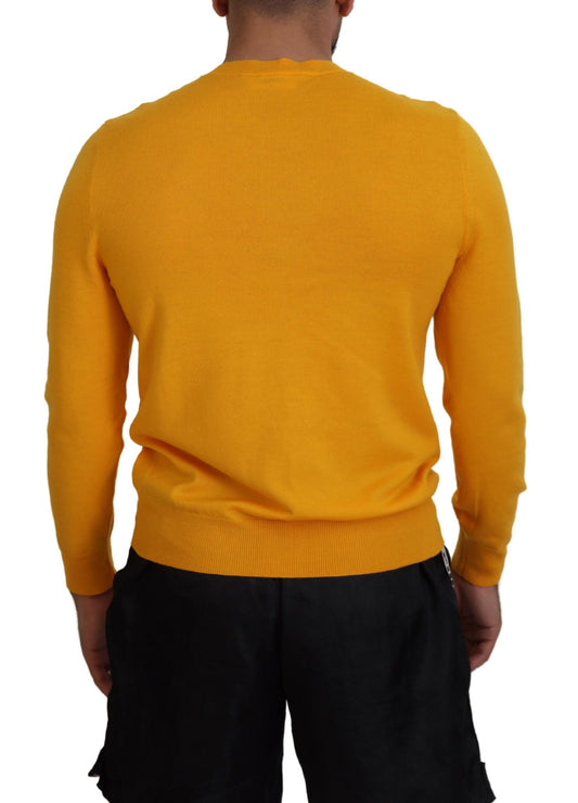 Yellow sweater on man's back
