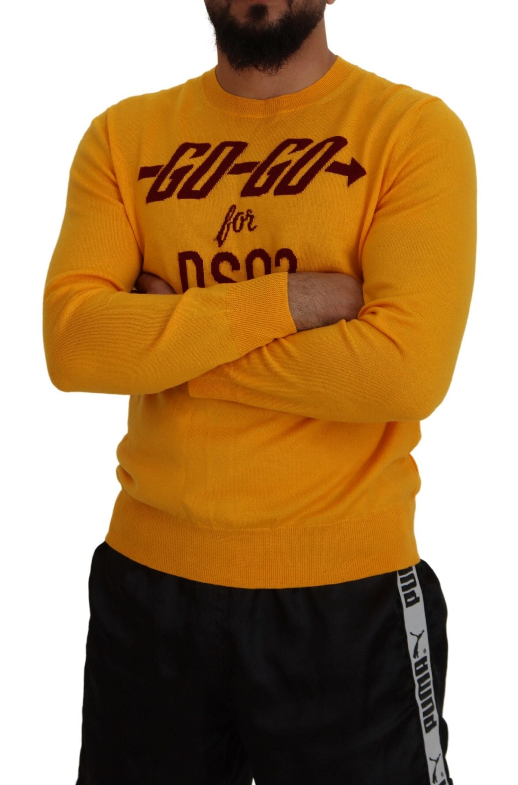 Man wearing yellow sweatshirt with "Go Go" written on front