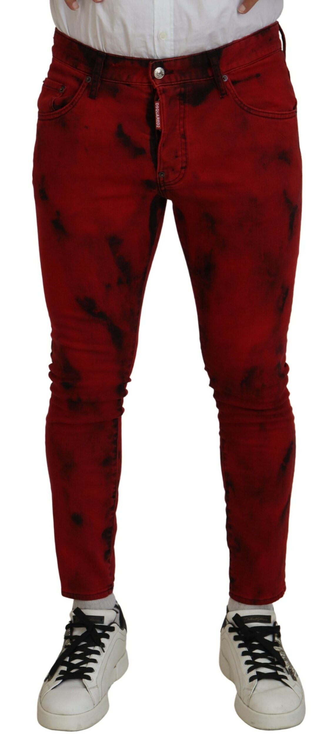 Red distressed jeans on a person