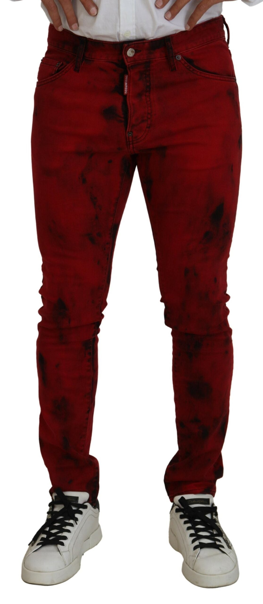 Man wearing red pants and black shoes