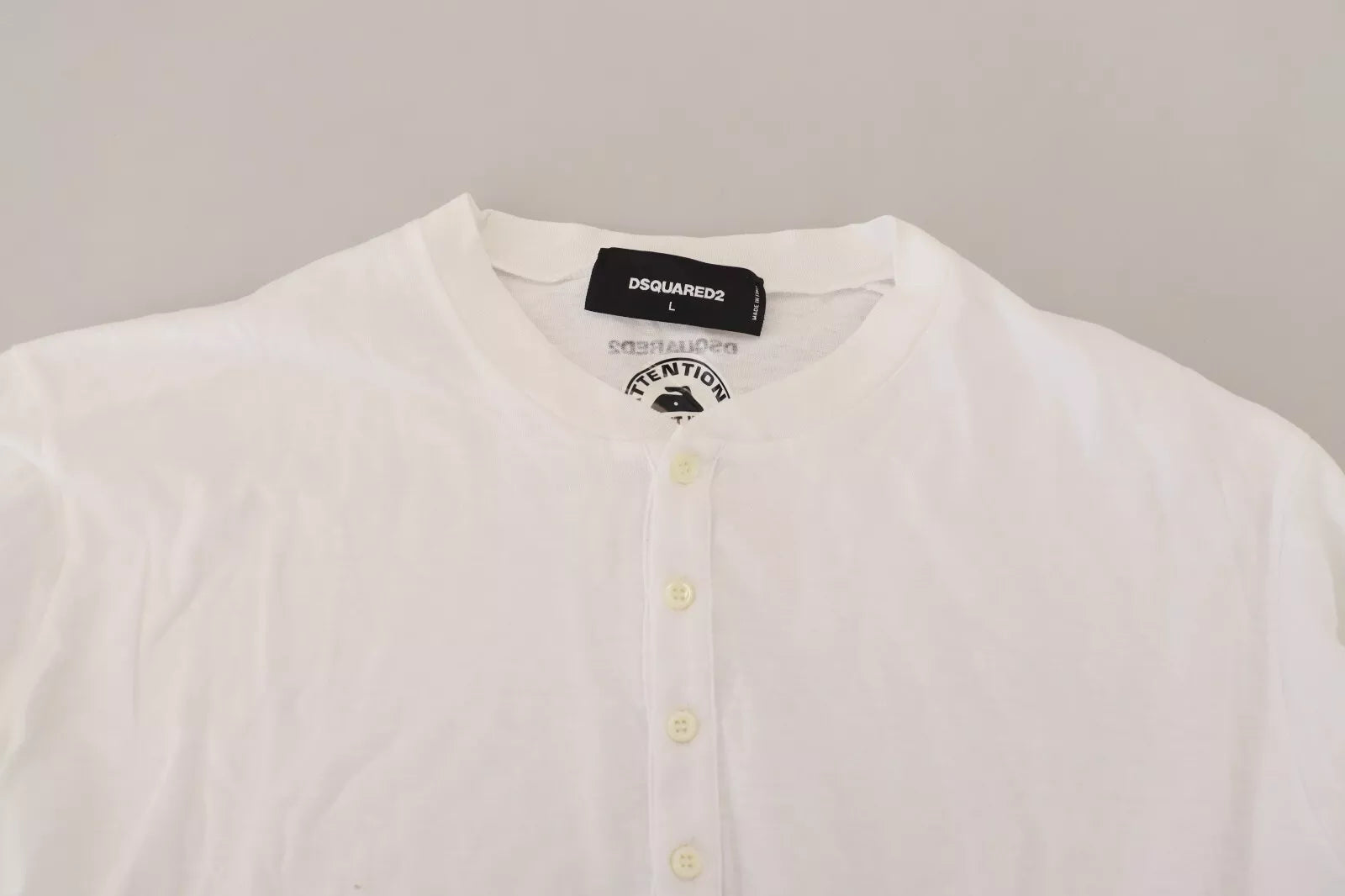 White button down shirt on hanger