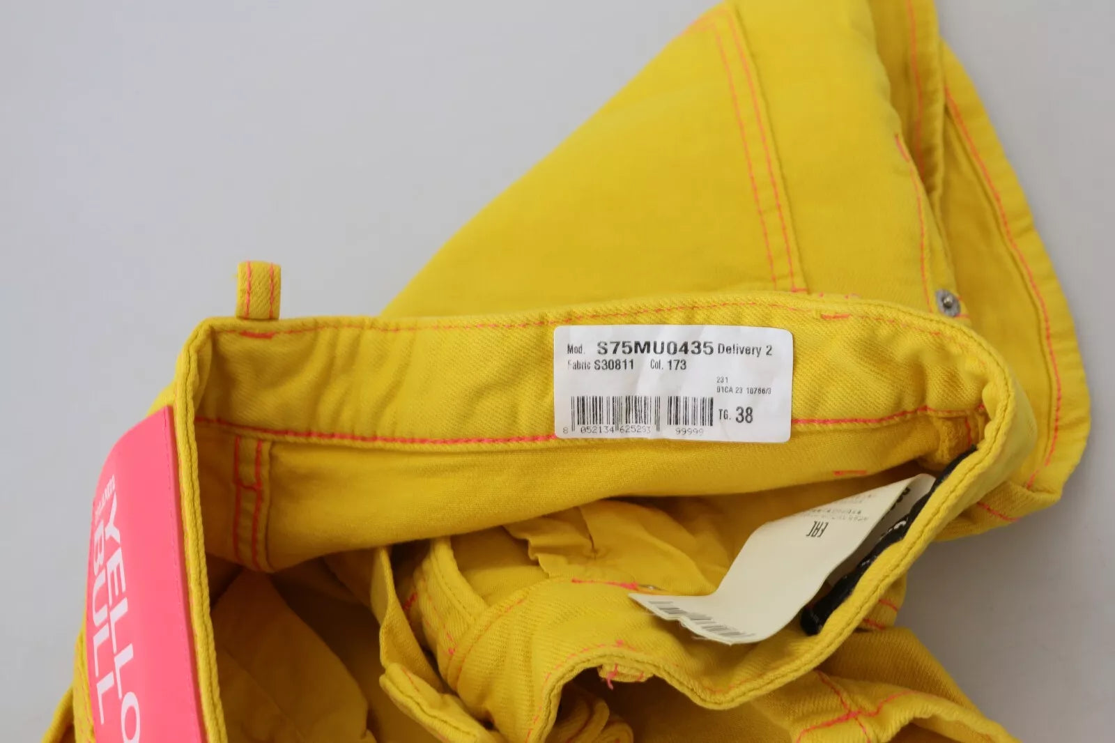 Yellow cotton high waist baggy women's shorts with label and tag