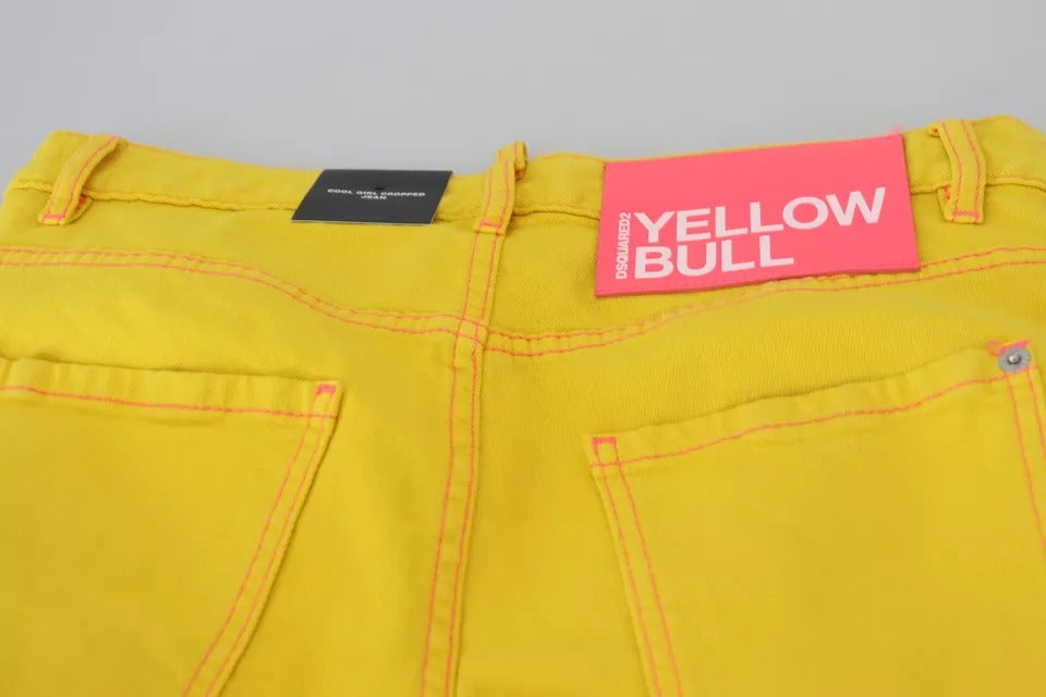 Yellow jeans on hanger with tag