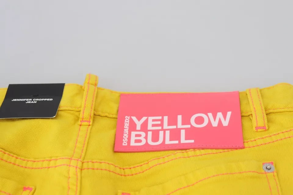 Yellow jeans on hanger with tag