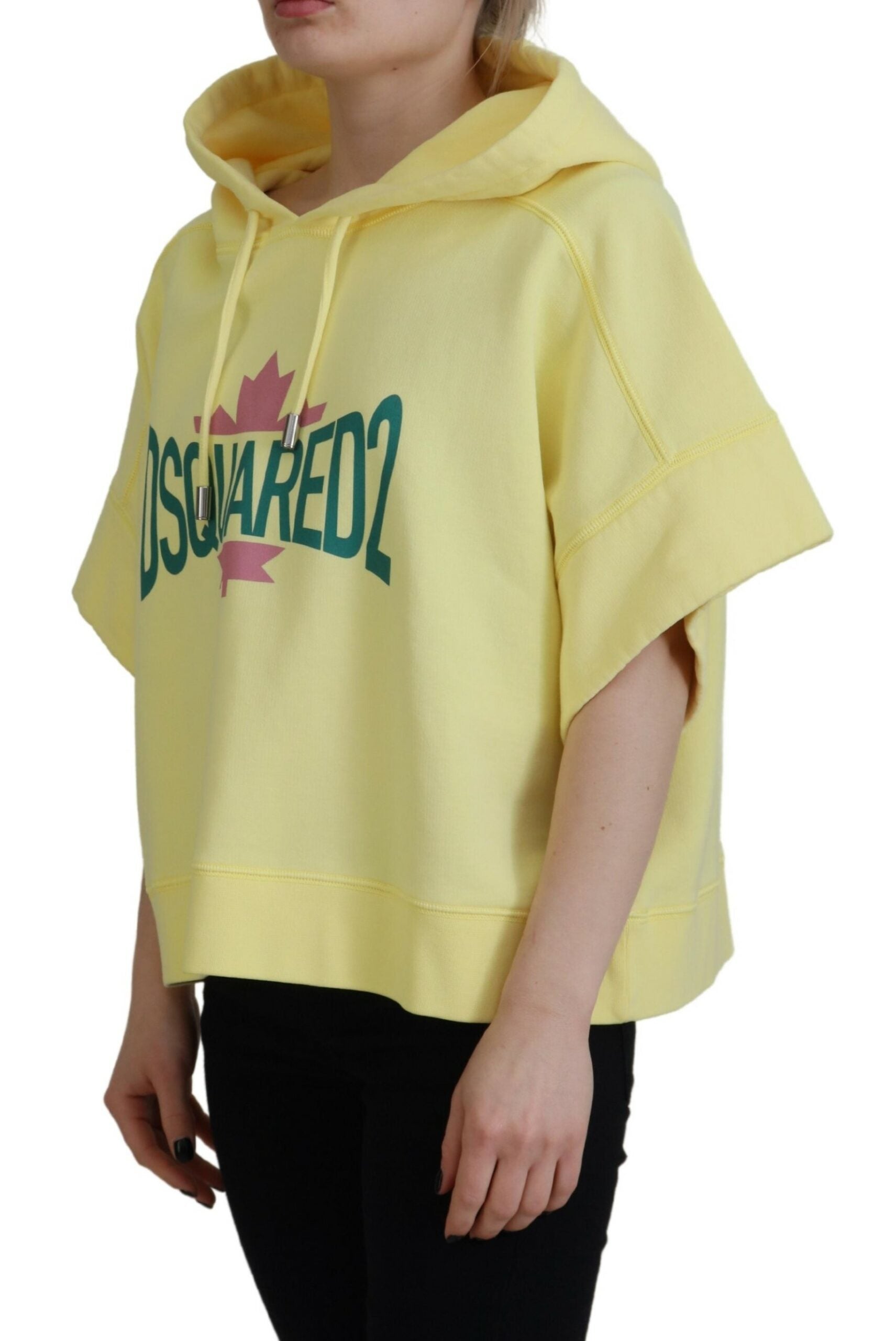 Yellow hoodie with maple leaf design on front