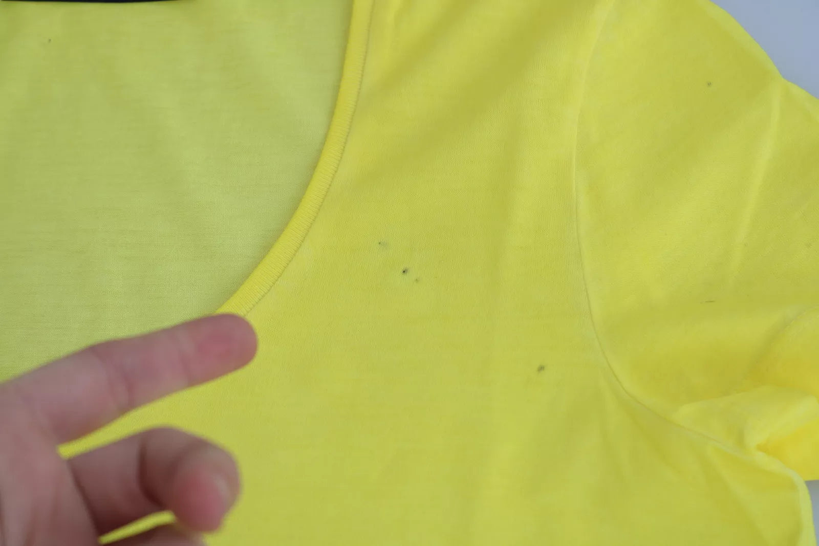 Yellow sleeveless top on display