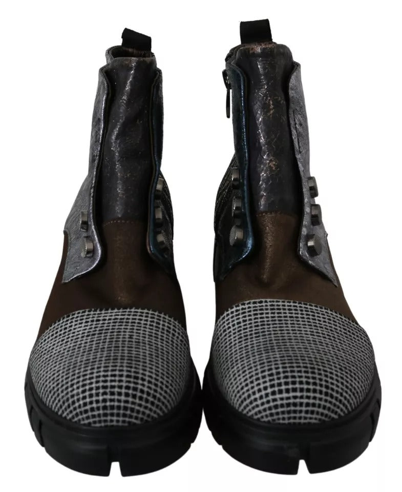 Pair of brown boots with silver buckles