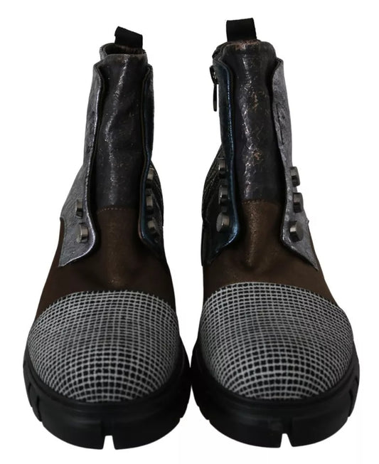 Pair of brown boots with silver buckles