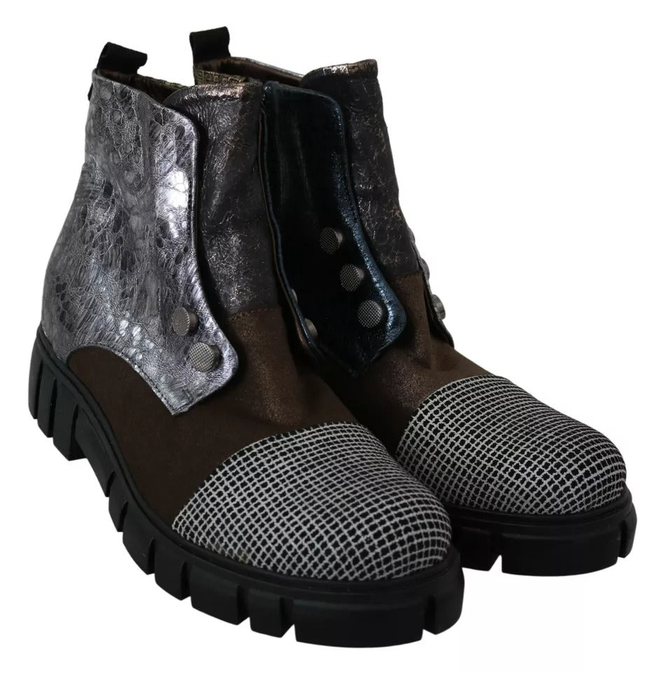 Pair of brown boots with silver buckles