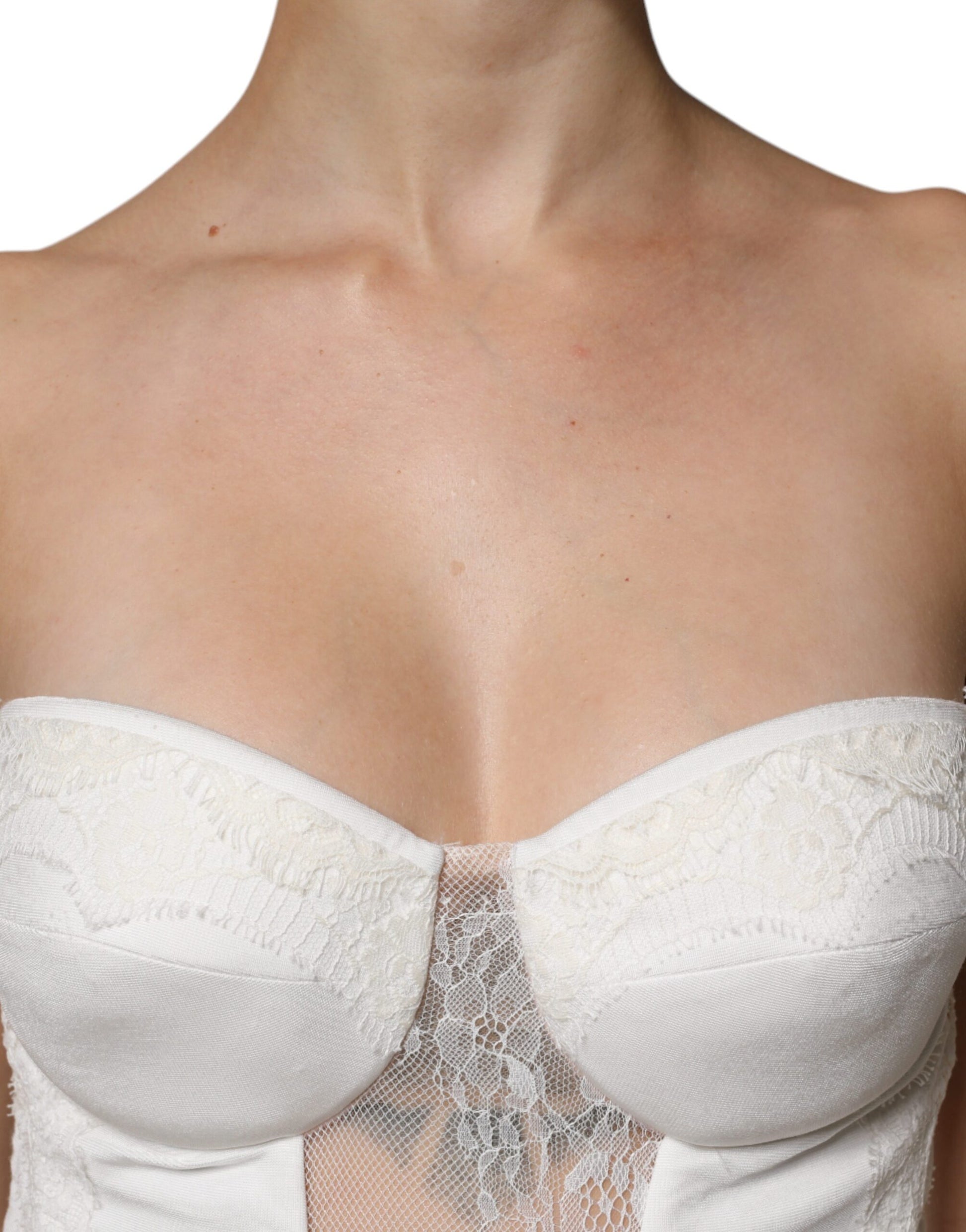 A white strapless bustier with lace detailing, part of a mermaid gown dress