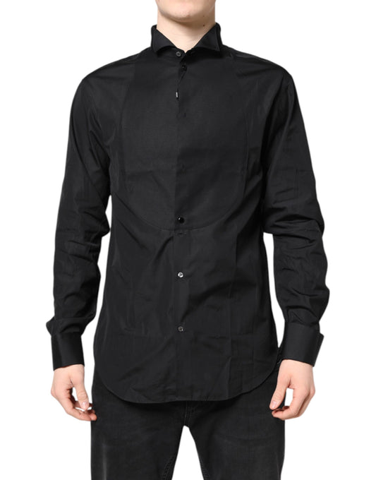 A black cotton long sleeve dress shirt from the brand Emporio Armani. It is designed as a formal wear item an