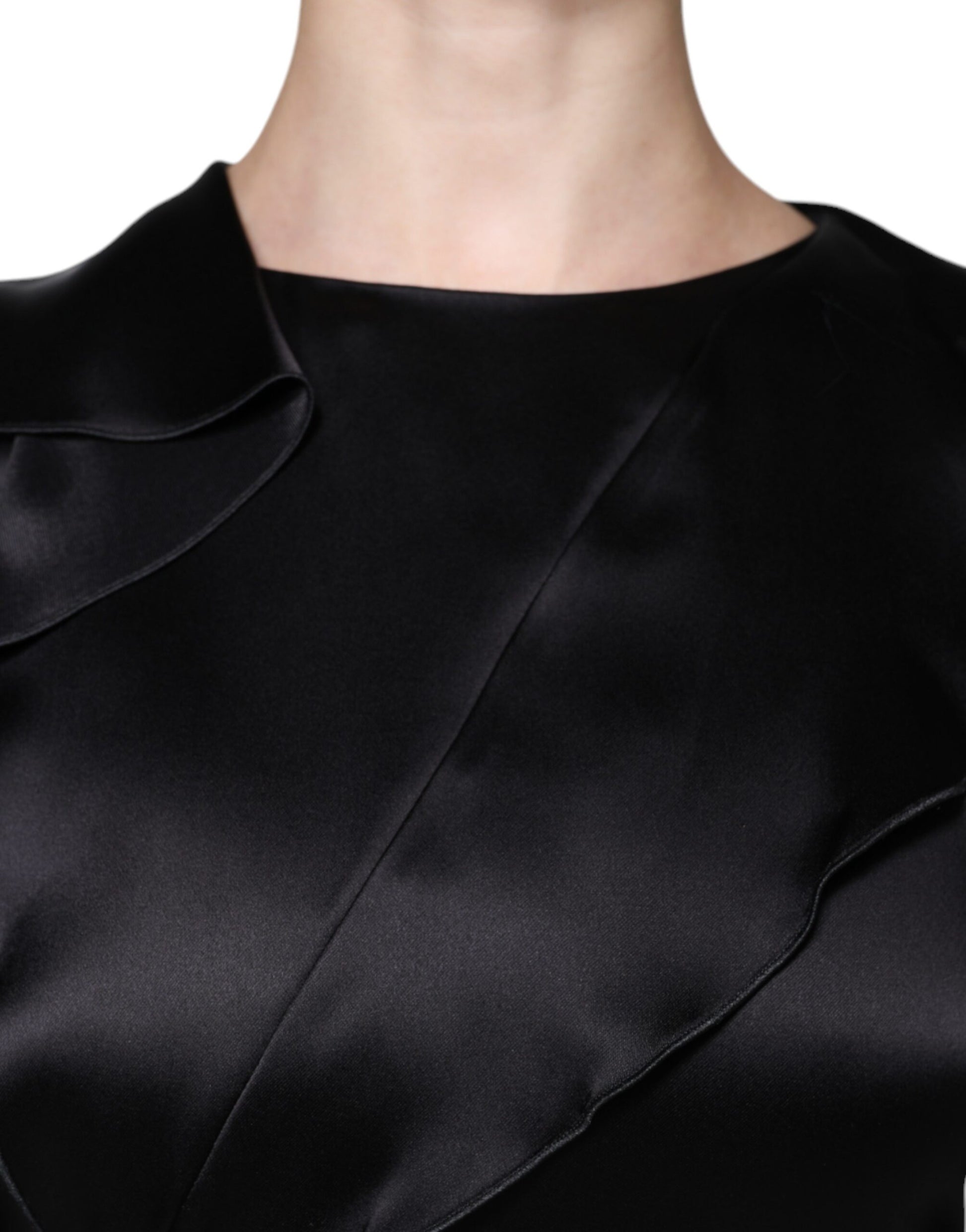 A black satin long sleeve wrap sheath mini dress with a V-neckline