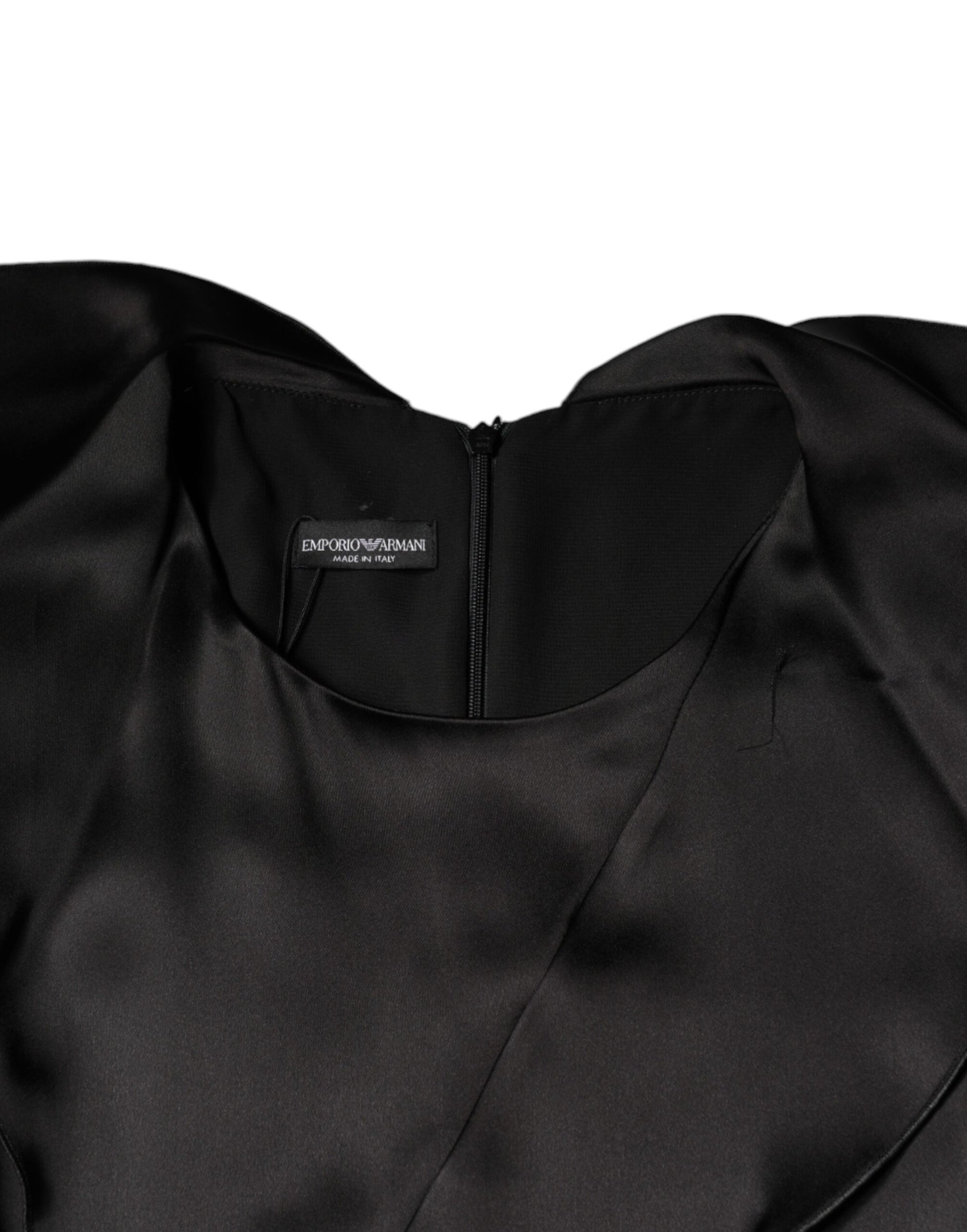 A black satin long sleeve wrap sheath mini dress with a label on the inside